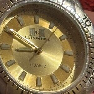 Calvin Hill Gold and Silver Quartz Watch with Brown Leather band .